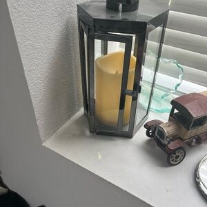 Elegant Black Lantern with Yellow Candle